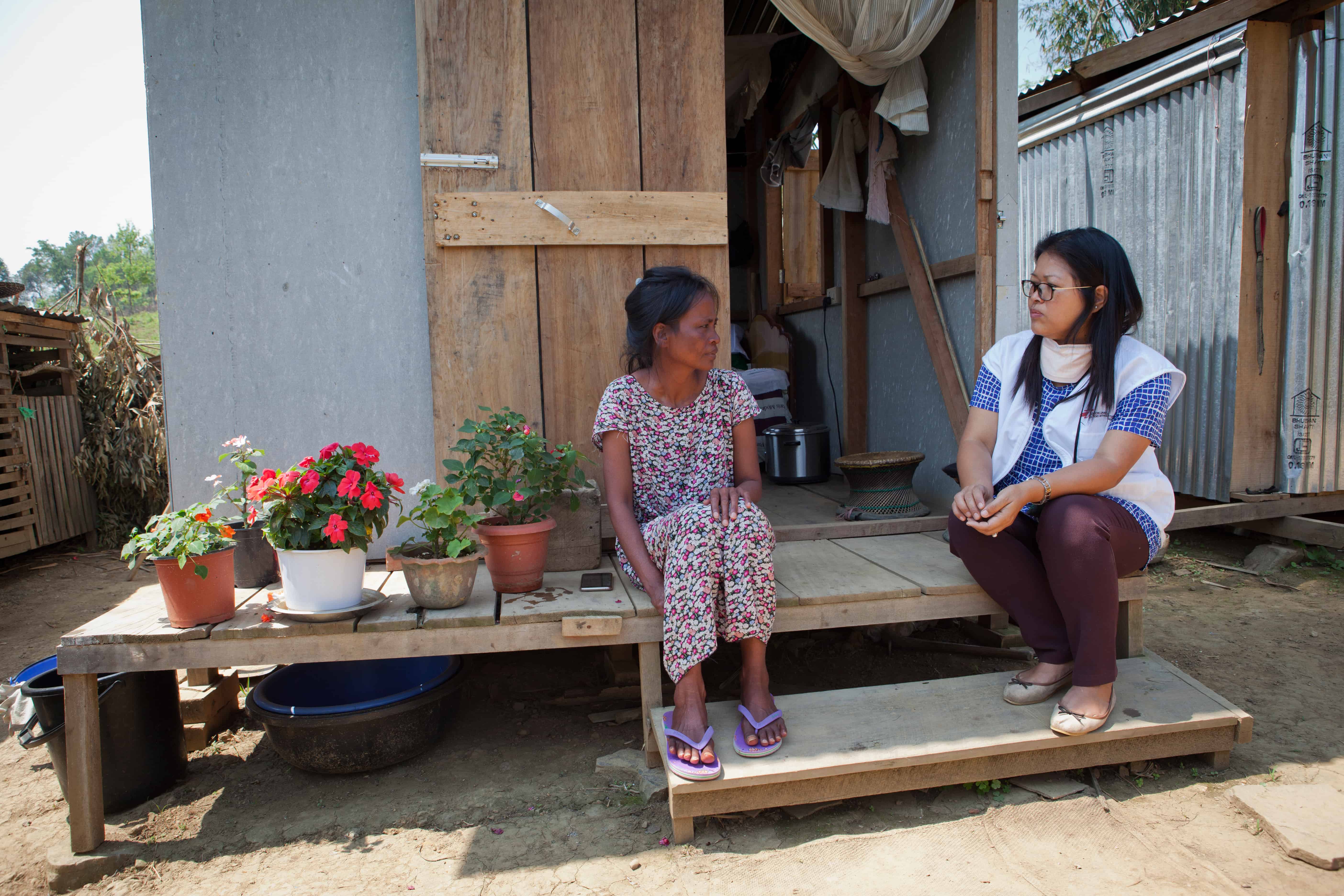 Neilam Synrem (47) Neilam Synrem, who is receiving treatment for MDR-TB, talks to an MSF counsellor in front of the house MSF built for her next to her family home, in order to reduce the chances of transmission of the disease to the rest of her family. Manipur, India, April 2019.
© JAN-JOSEPH STOK