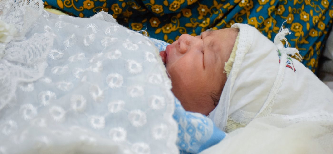Iraq: maternal health activities in Mosul – June 2019 Mother: Najlaa Mohammad
“I live in Mosul in the western part. This is the first time I come to Nablus hospital. My relatives and neighbours gave birth in this hospital. My sisters and my nieces gave birth in this place.
I have been childless for nine years, but God graced me with this baby suddenly. This is my third baby. When I was told I was pregnant I was shocked and I started crying and I did not believe them. It is an indescribable feeling.
As soon as the labor pains restarted, I arrived at the hospital at 01:00pm. The doctor told me to wait until the night comes and maybe even until dawn. When the bleeding started, that is when they rushed me into the operation room.
Today is my third day in this hospital since I had a caesarean, but I will be discharged today. This time, my sisters will come to pick me up instead of coming as visitors. I cannot describe my happiness, leaving the hospital and with me my child, little Mahmoud.”